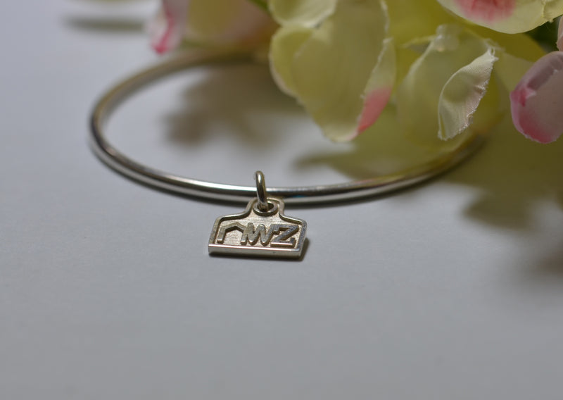 BRAND STERLING SILVER BANGLE & CHARM