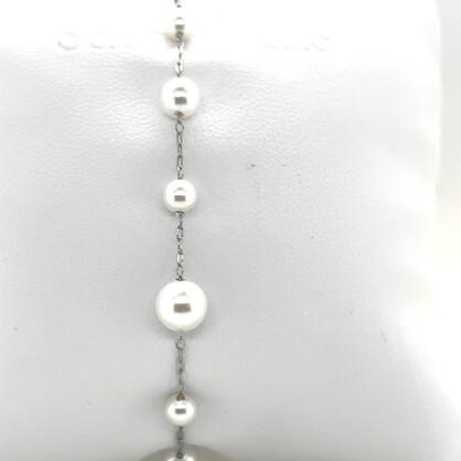 White pearl bracelet on SS chain